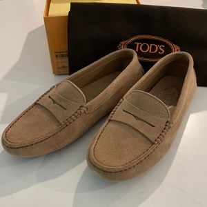 Tod’s flats, never worn.